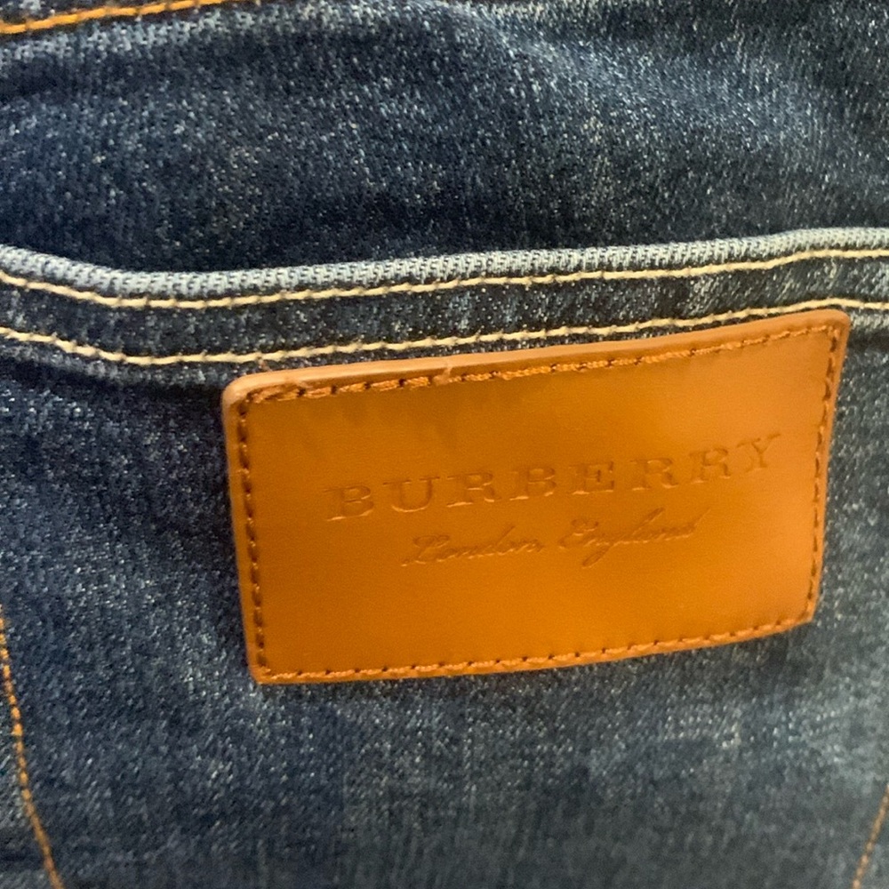 Burberry skinny jeans never worn.  New without tags .